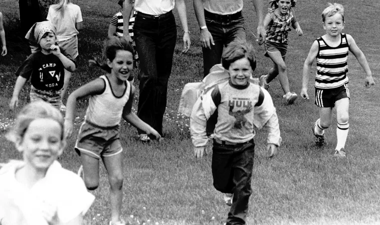 YMCA of Cass and Clay Counties archive photo of children running.