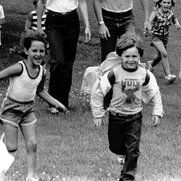 YMCA of Cass and Clay Counties archive photo of children running.